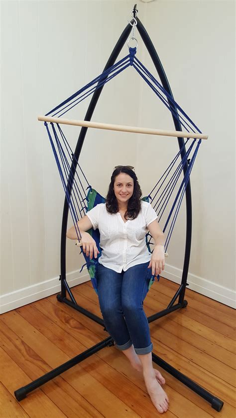 Choose from hammocks in calming neutral. Blue Padded Hammock Chair With Wooden Arm Rests And Pillow ...