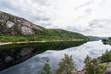 Norway Landscape With Lake And Reflection Cloudy Blue Sky Stock Photo