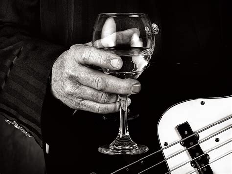Guitar Player And A Glass Of Wine Photograph By James David Phenicie