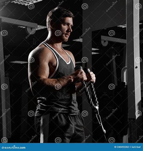 Muscular Athletic Young Man Do Exercises In Gym Stock Photo Image Of