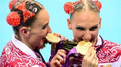 Why Olympians Bite Their Medals Cnn