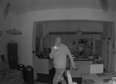 Watch Chilling Moment Masked Man Stares Into Security Camera As He Burgles Chorlton Home In