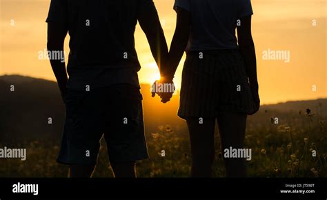 Couple Holding Hands Silhouette Hi Res Stock Photography And Images Alamy