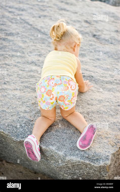Back View Of Little Girl On The Beach Stock Photos And Back View Of