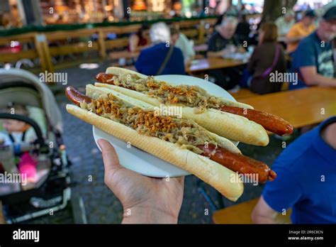 German Bavarian Hot Dog In Viktualienmarkt Munich With Sauerkraut