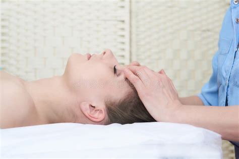 Beautiful Young Woman Getting Facial Massage In The Spa Salon Stock Image Image Of Natural