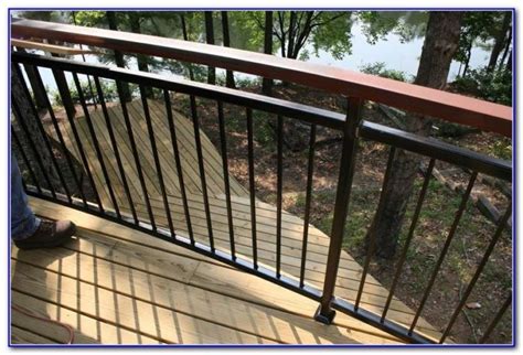 Elegant & intuitive cable rails for decks w/ a clean & slim profile. Metal Deck Railings Do It Yourself | Deck railing design, Metal deck, Metal deck railing