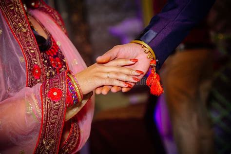 Close Up Of Indian Couple`s Hands At A Wedding Stock Photo Image Of