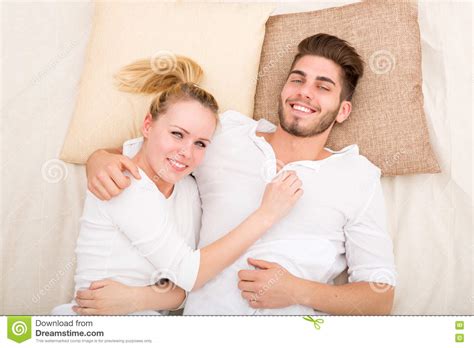 Happy Young Couple In Bed Stock Image Image Of Bedroom 77910929