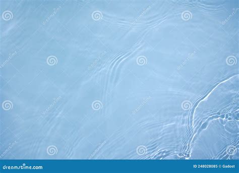 Transparent Blue Colored Clear Calm Water Surface Texture Stock Image