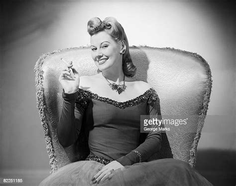 Elegant Woman Smoking Cigarette Posing In Studio Bandw Portrait Photos