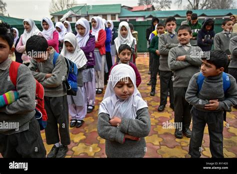 Kashmiri Students Pray During Morning Assembly In Their School Premises