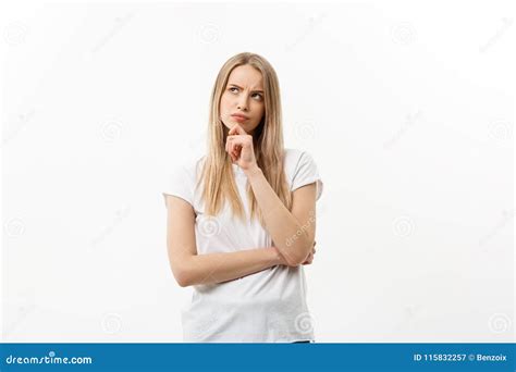 Portrait Young Serious Caucasian Woman Thinking Of Something Isolated