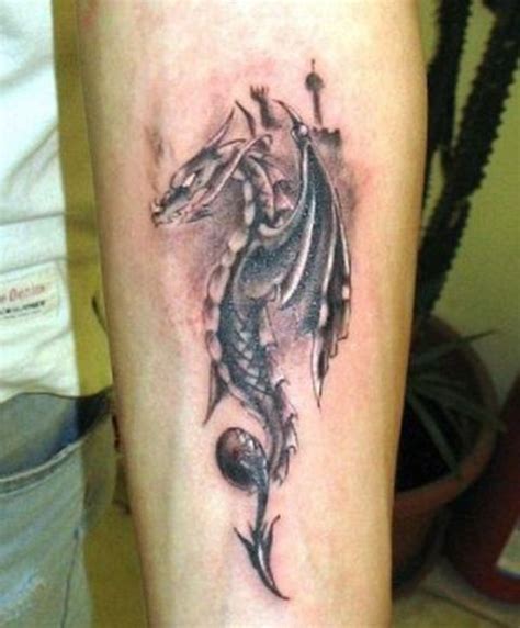 165+ dragon tattoo designs for women (2020) arms, shoulder, chest. Picture Of Small dragon tattoo idea on the forearm