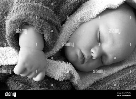 Sleeping Baby With Bathrobe Stock Photo Alamy