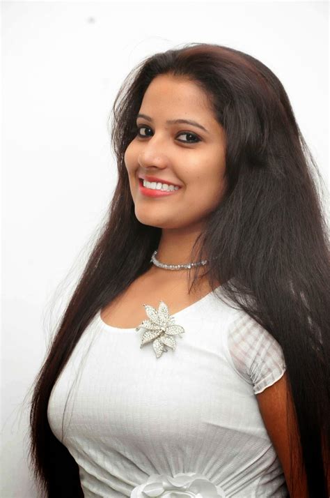 Deconstructed updo hairstyles for long hair are very popular because they feature a lower degree of elegance and can be worn casually providing a smart add some modernity to the hairstyle by simply including twisted pieces of hair on either side of your head. Actress Telugu Vandana for Long Hair Gallery - SHINER PHOTOS