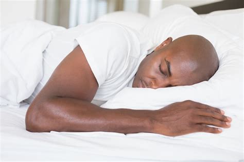 Shutterstock205433167 Peaceful Man Sleeping In Bed At Home In The