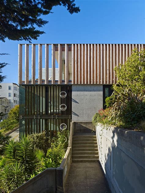 Check spelling or type a new query. Garage and 3rd Floor Deck connects Glass Home to Slope