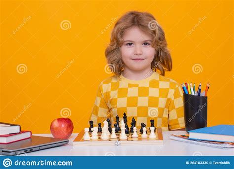 Child Thinking Near Chessboard Learning And Growing Children