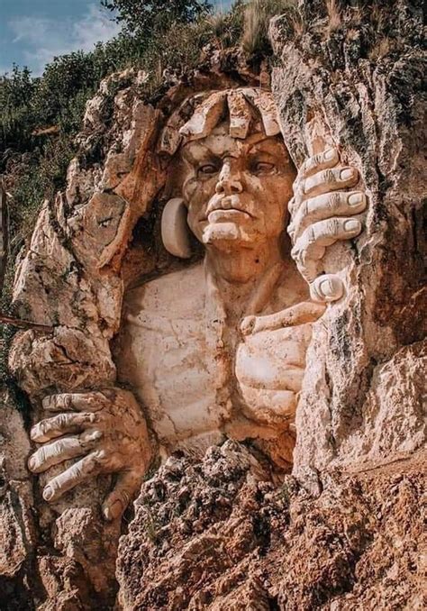 Sculptures Of Ancient Andean Gods Carved Into A Mountain In Peru