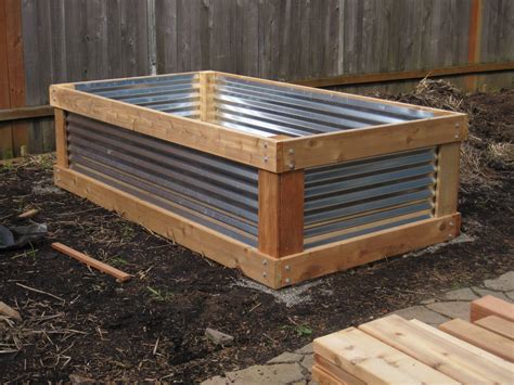 Materials used galvanized metal wood screws metal plates 2x4 wood diy corrugated metal raised beds. Aristata Land Arts: CEDAR & METAL RAISED BED PROJECT