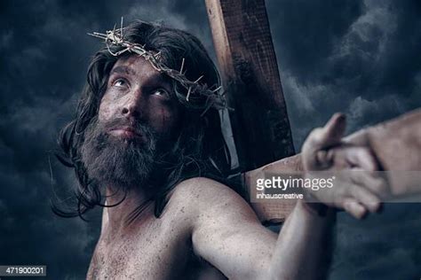 Jesus Christ Nailed To The Cross Photos And Premium High Res Pictures