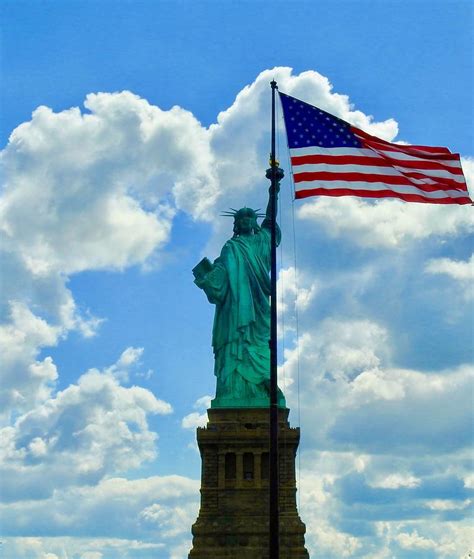 Statue Of Liberty Holding American Flag Photograph By Kenneth Summers