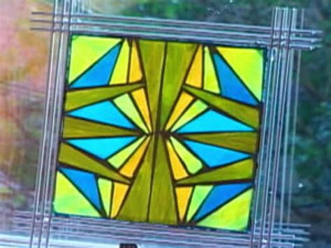 The stained glass piece measures 16 x 23 with a chain on the back side for easy hanging. How to Make Mosaic Stained Glass Art | HGTV
