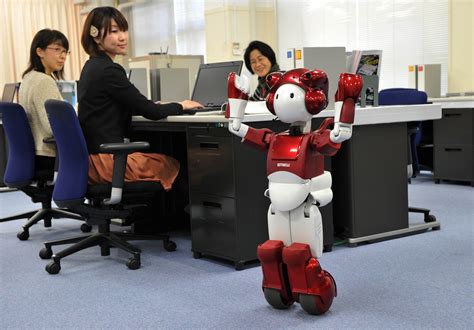 Hitachi Unveils Humanoid Service Robot The Japan Times