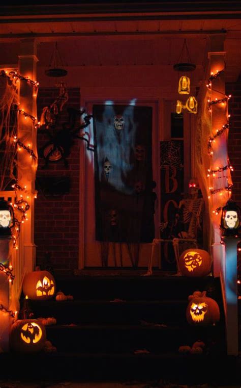 Spooky Halloween Front Porches With Lighting Ideas Homemydesign