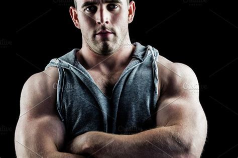 Handsome Bodybuilder With Arms Crossed High Quality Stock Photos