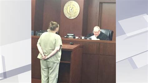 judge enters not guilty plea for woman accused of setting husband on fire