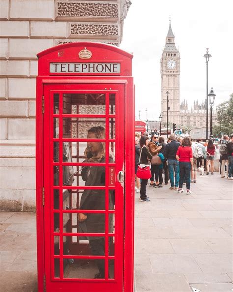 10 Photo Ideas With The Famous London Phone Booth Perfect For Instagram
