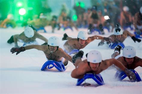 Nearly Naked Sledding In Germany Draws Crowd