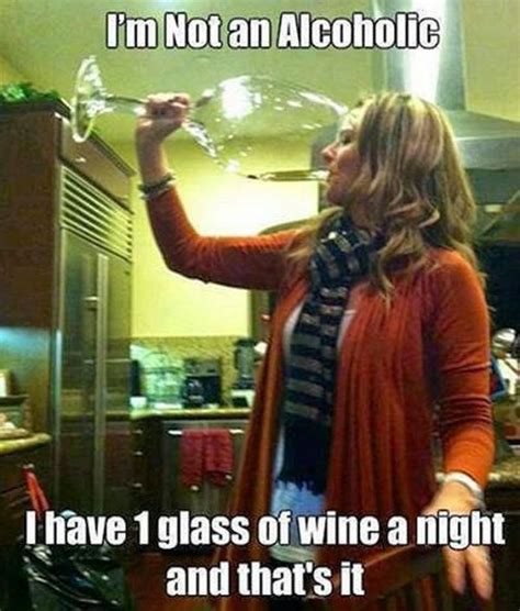 A Woman Drinking From A Wine Glass In A Kitchen With The Caption Im