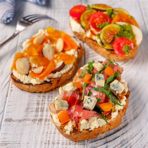 Italian Crostini With Cheese Tomato And Ham Stock Image Image Of Beet