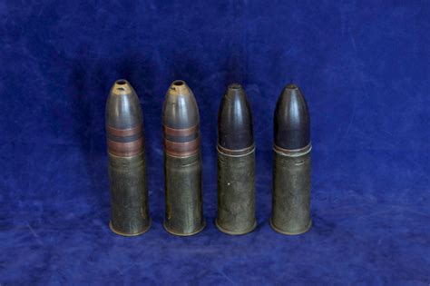 Four Inert World War I German 37mm Pom Pom Shells Two Engraved With