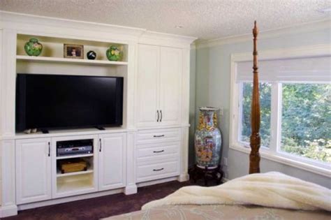 They can be custom built to make perfect storage for peoples wardrobes as well as create a spot for the tv and whatever books or display woodworking talk. Custom bedroom TV wall unit with built in cupboard ...