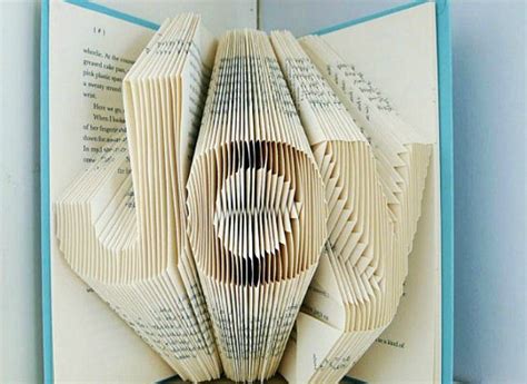 12 Easy Book Themed Diys To Tackle This Weekend Book Folding Easy