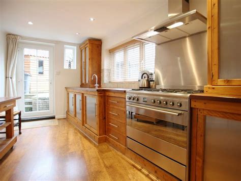 Put all the base cabinets in place, then mark a line on the subfloor corresponding to the front edge of the toekick. Get All Timber Flooring Solution under One Roof | Light ...