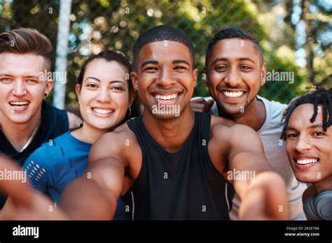 Its Just Smiles All Around When Were Together Portrait Of A Group Of Sporty Young People Taking