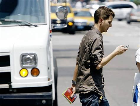 Texting While Walking Might Be Illegal · Guardian Liberty Voice