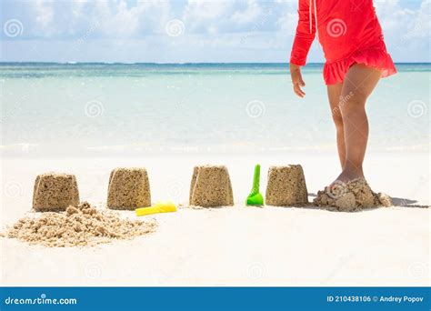 Girl Breaking The Sandcastle With Leg At Beach Stock Photo Image Of Crushing Natural