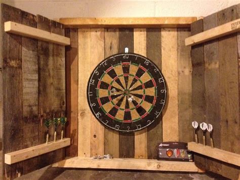 It protects the wall from random shots and gives your games a real space of games. Upcycled dartboard for Irish Pub | Dartboard cabinet plans ...