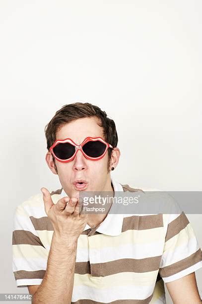 Man Blowing Kiss Photos And Premium High Res Pictures Getty Images