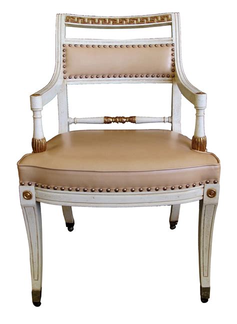 A Pair Of Hollywood Regency Ivory Painted And Parcel Gilt Klismos Armchairs