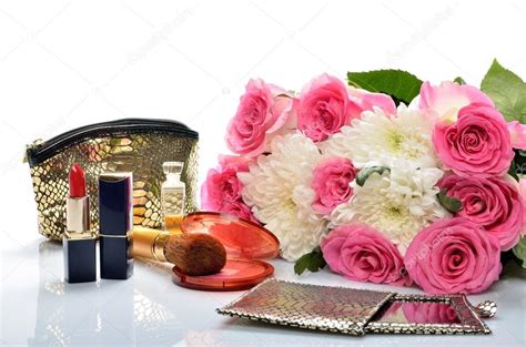 Womens Jewelry Perfumes Cosmetics And A Bouquet Of Flowers In Still