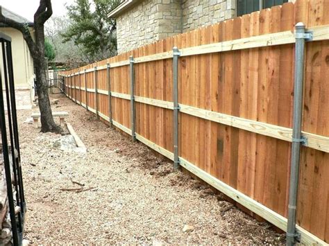 Now you can have both by using a wood to steel fence bracket like the. Installing Metal Post To Wood Fence Bracket - Home Ideas ...