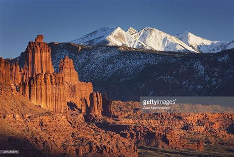 Fisher Towers And The Snowcapped La Sal Mountains Near Moab Utah In