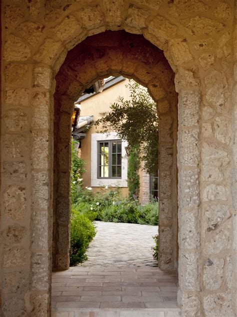 Mediterranean Walkway With Double Stone Archway Stone Archway French
